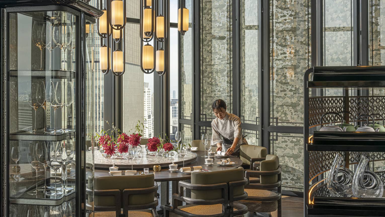 Light-filled dining area inside Jiang Nan Chun restaurant at Four Seasons Hotel Osaka