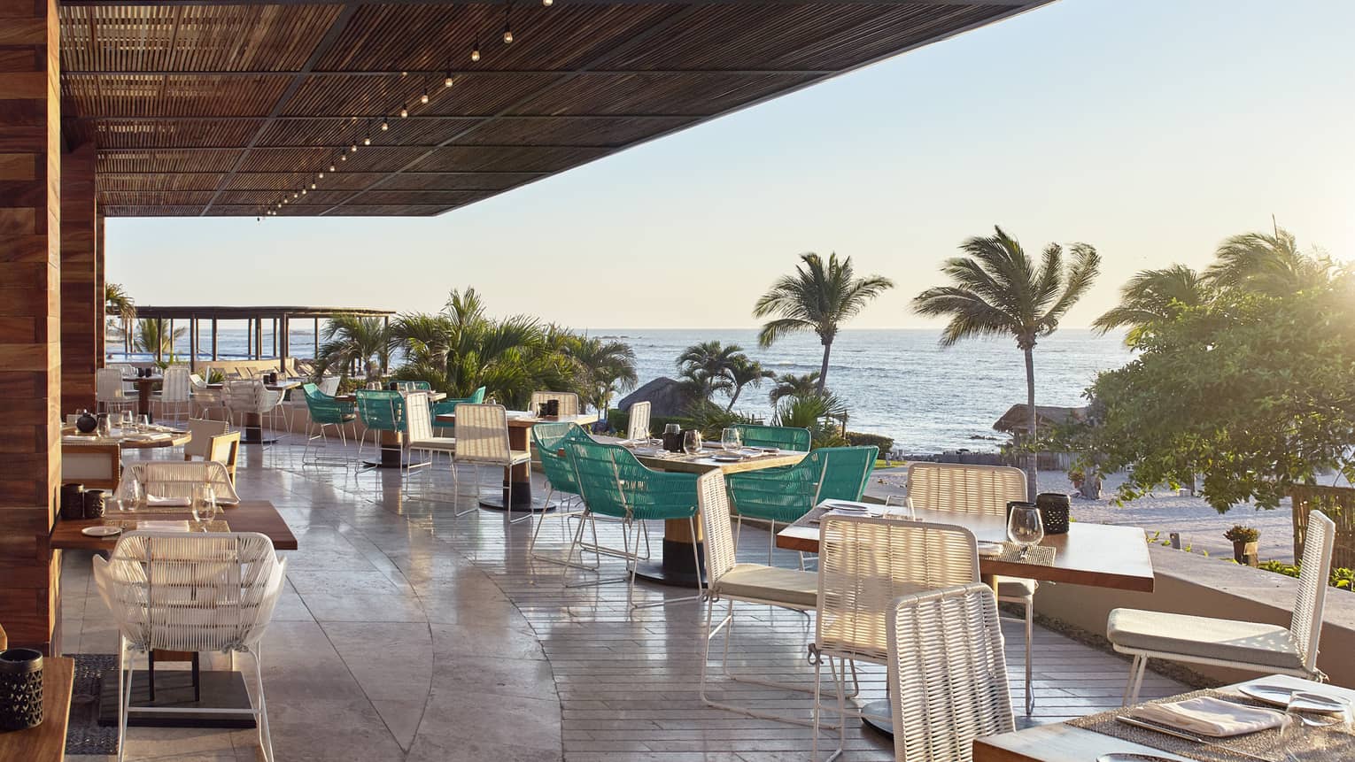 Dining tables along Dos Catrinas restaurant patio 