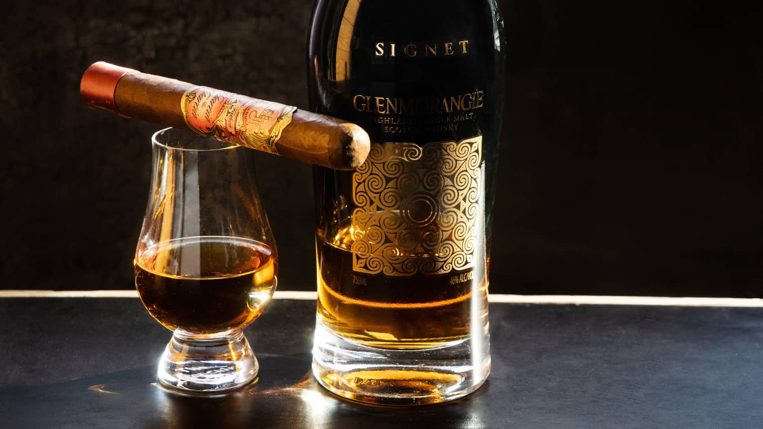 A cigar and whiskey.