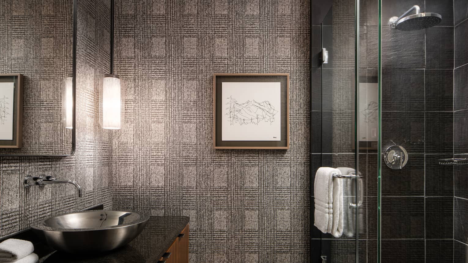 Bathroom with walk-in glass shower, artwork on wall