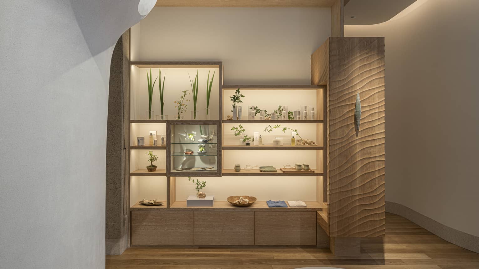 Modern spa boutique's illuminated shelving at The Spa at Four Seasons Hotel Osaka