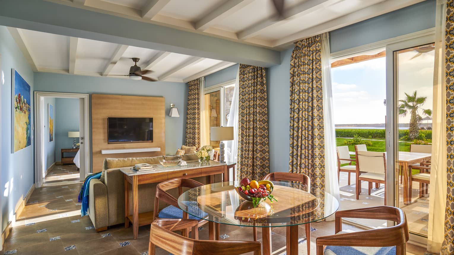 A brightly-colored beach suite overlooking the marsh at four seasons hotel alexandria 