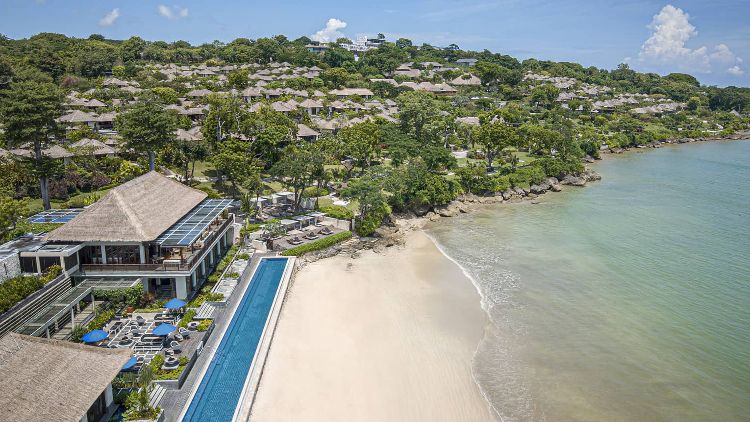Aerial shot of the Resort, visible shoreline and foliage