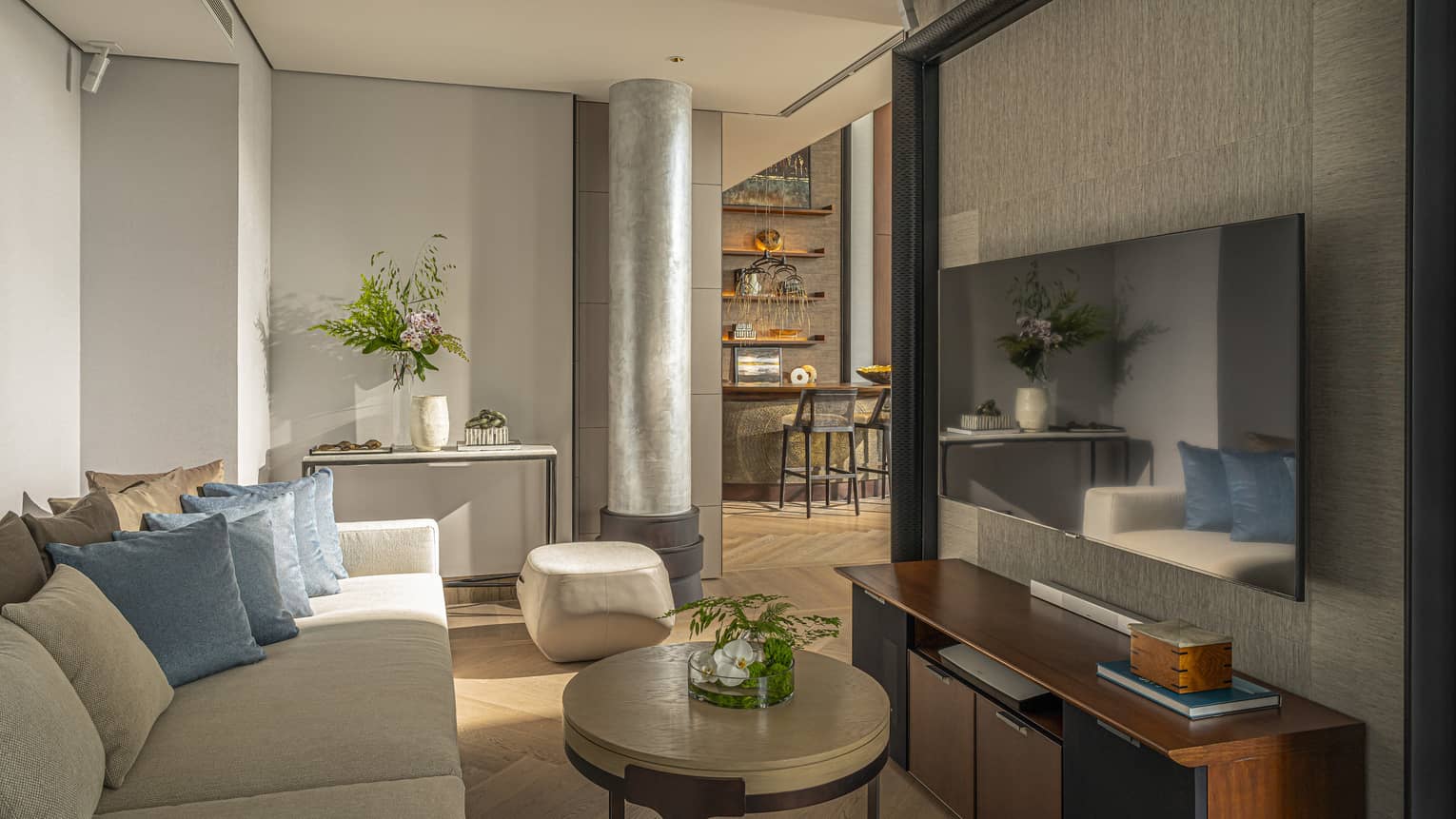 Sofa, coffee table and wall-mounted TV
