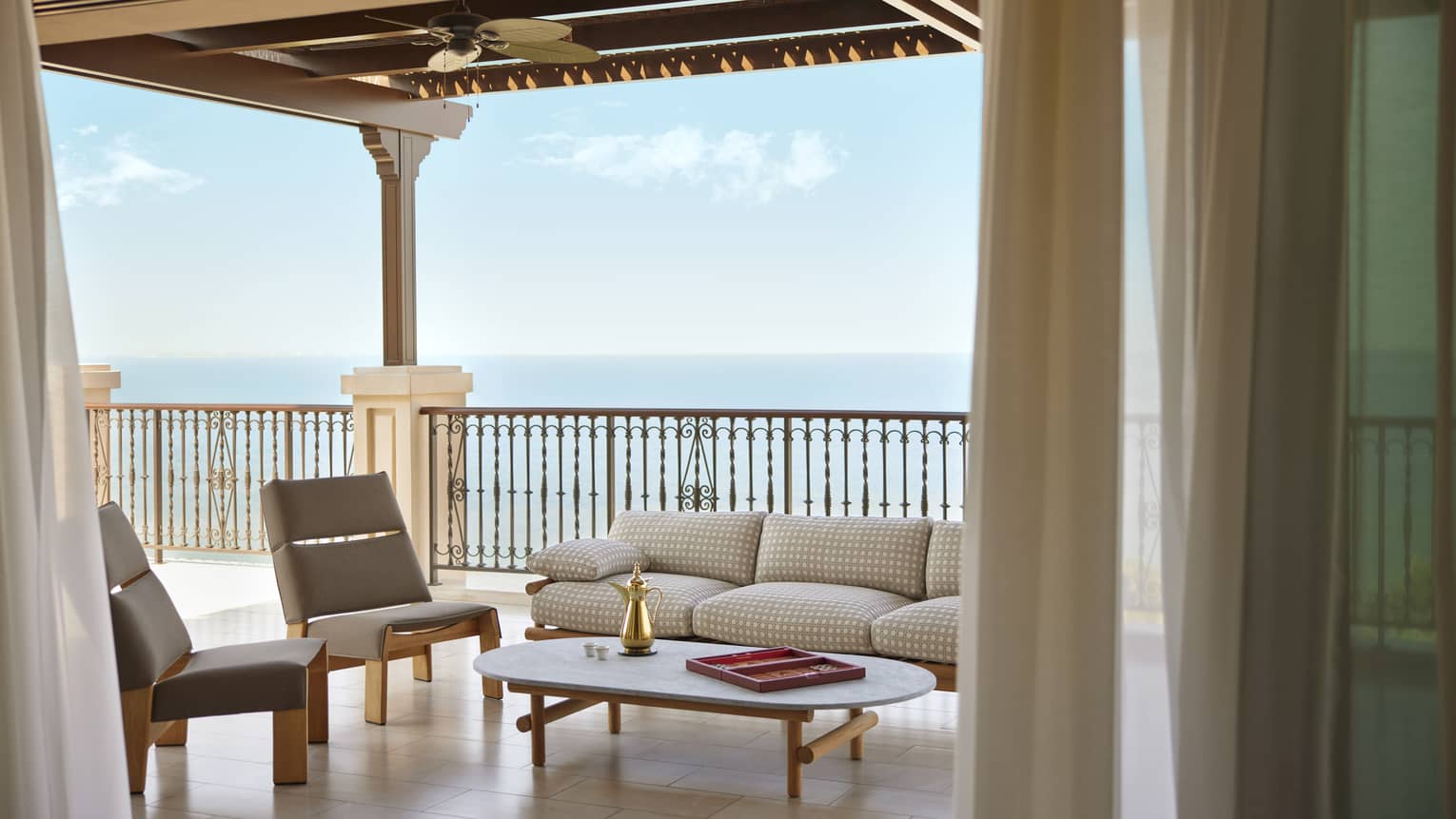 Covered terrace of luxury hotel suite with sea view
