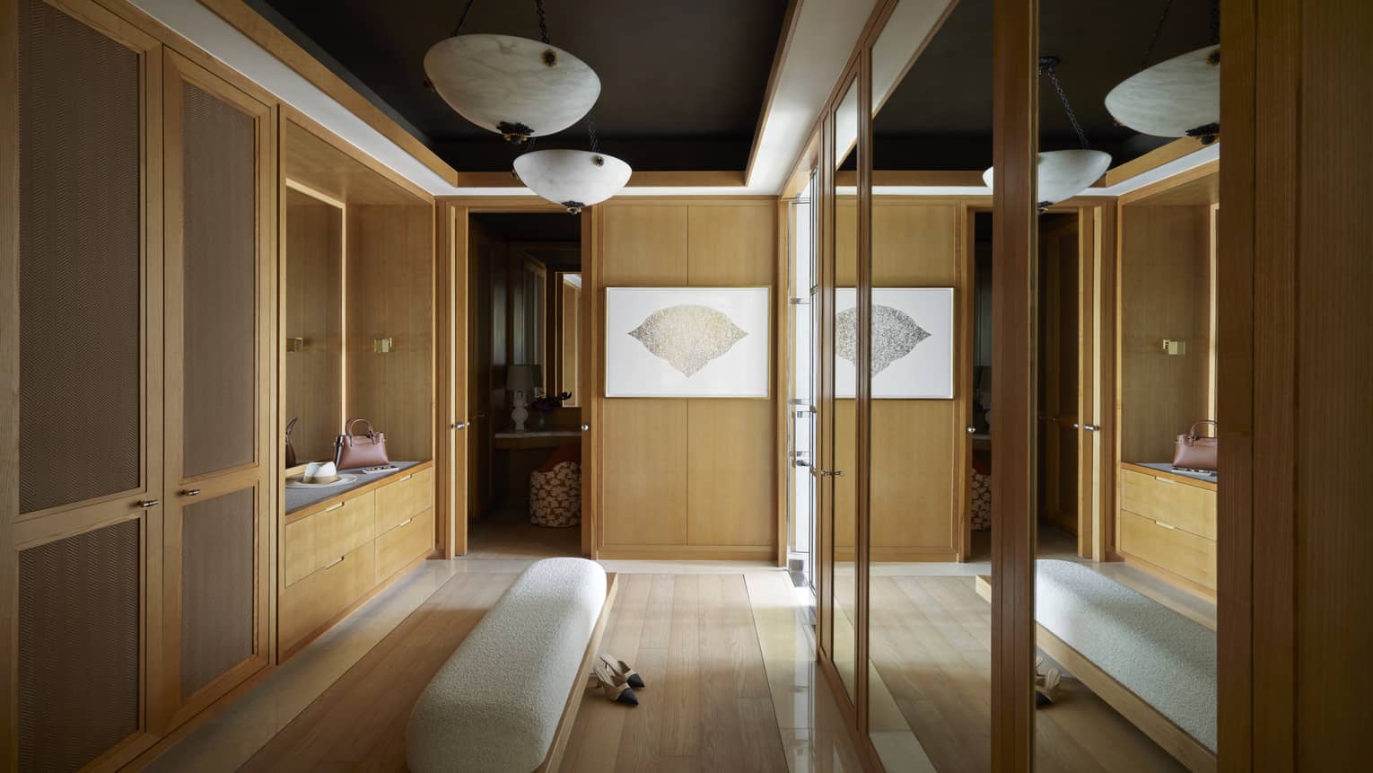 Large wardrobe and changing area of a luxury hotel suite