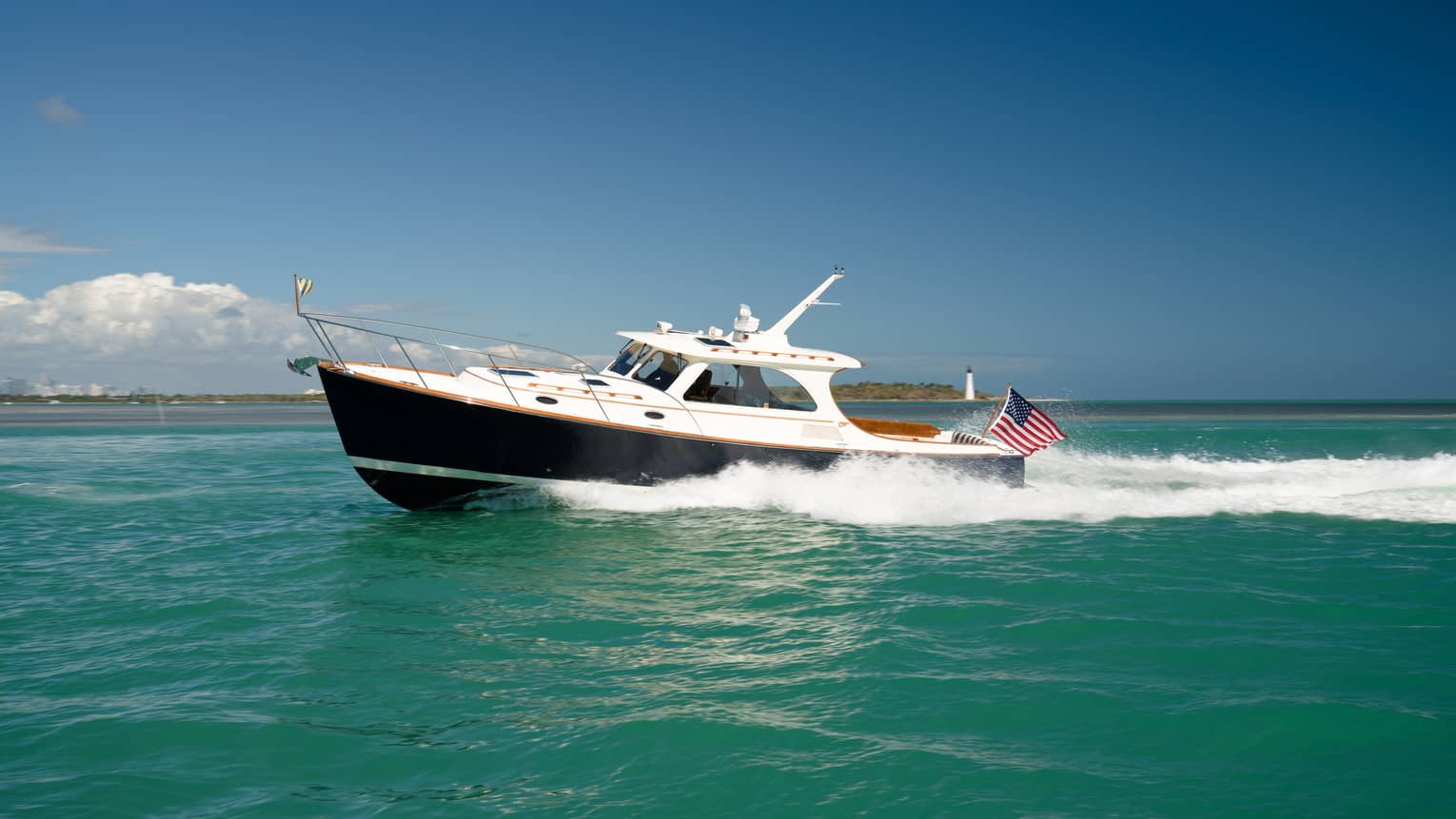 A boat speeding across water.