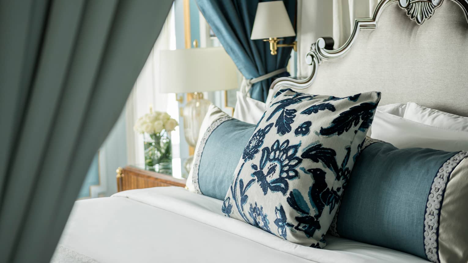 Presidential Suite bed with embroidered pillow
