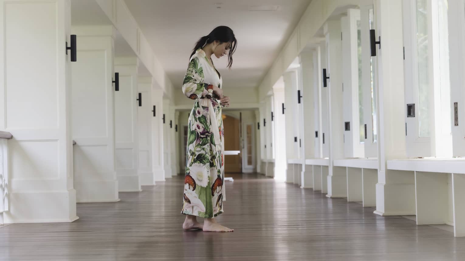 Woman wears colorful spa robe
