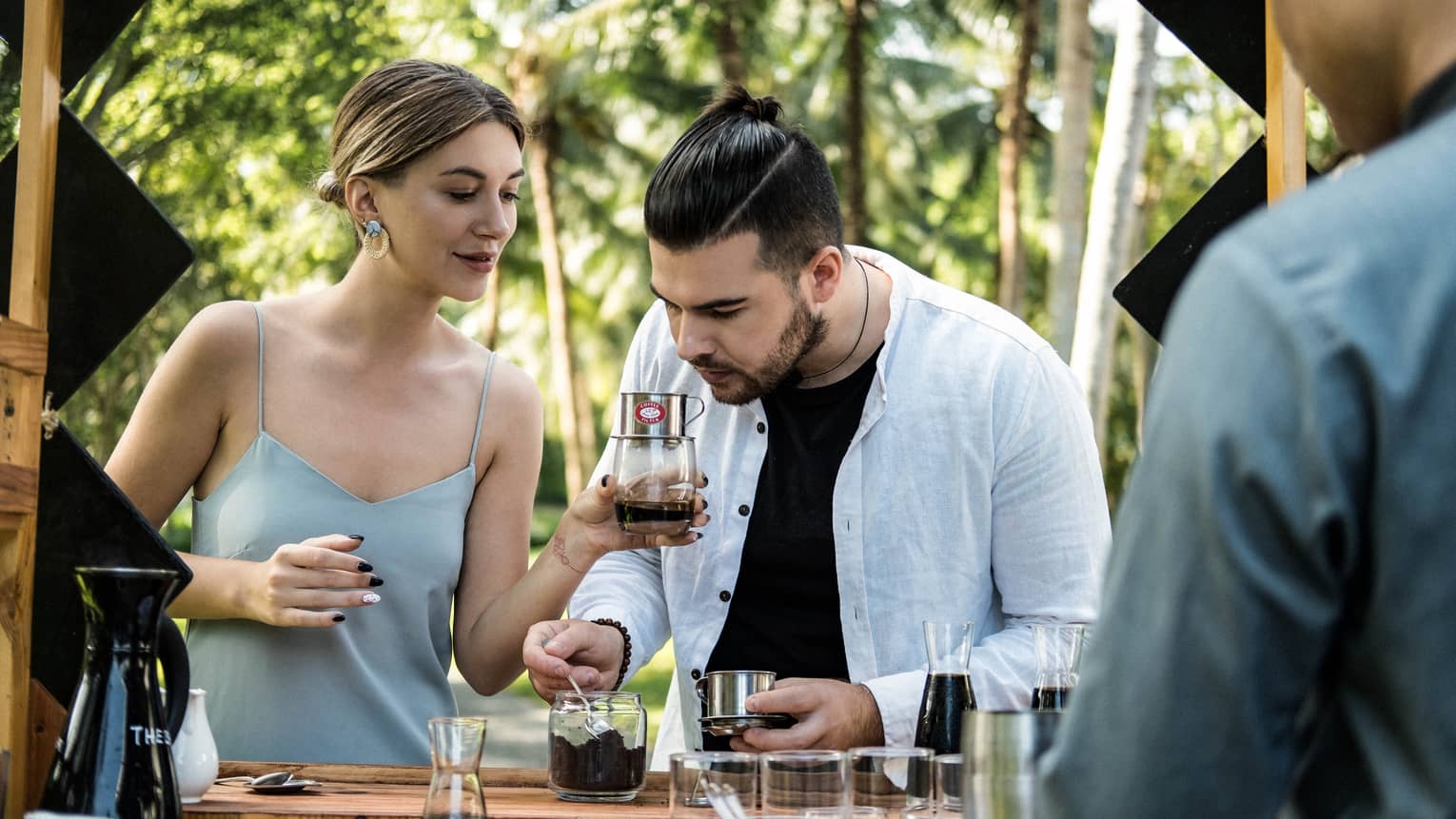 A couple participates in a coffee tasting session