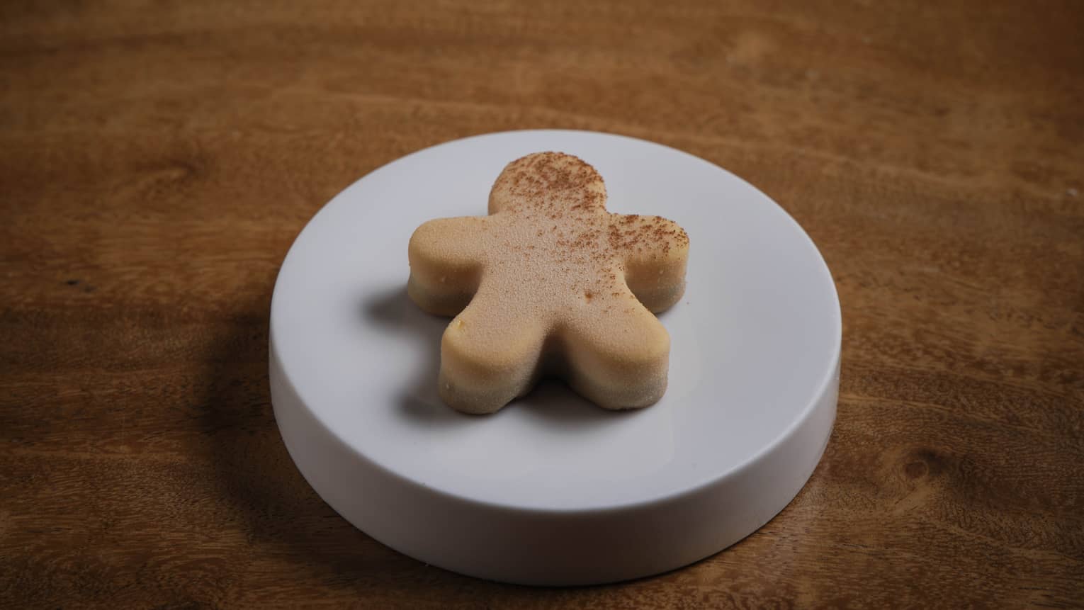 Fine dining dessert that looks like a gingerbread man