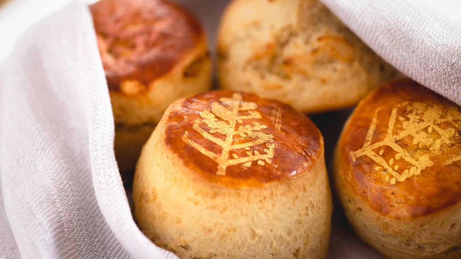 Golden biscuits with the Four Seasons logo