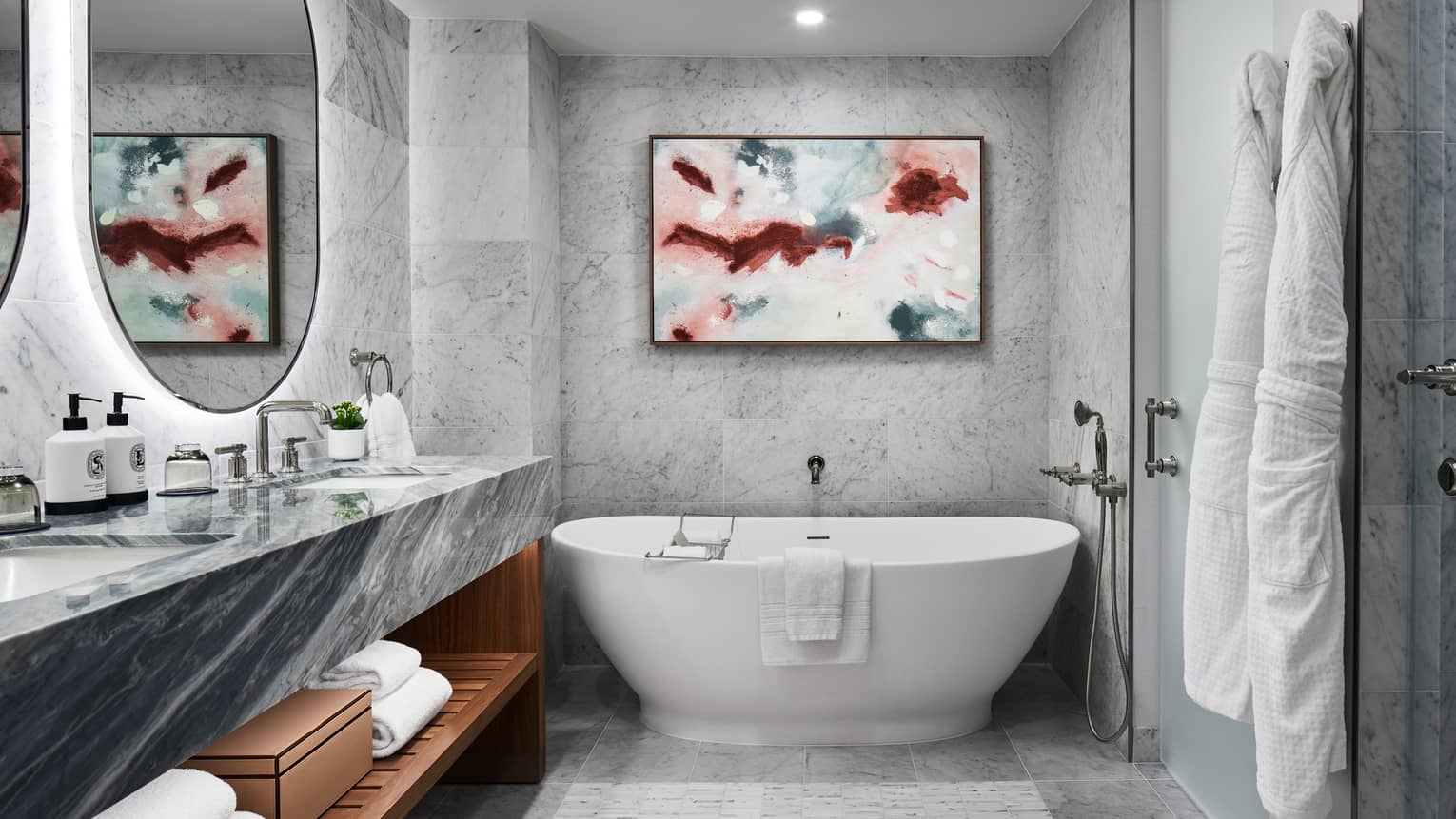 Luxury hotel marble bathroom with standalone tub and double vanity at Four Seasons Hotel Washington, DC