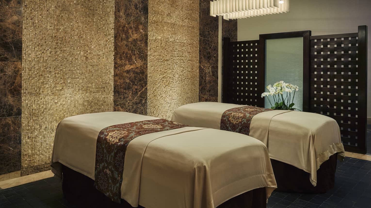 Couples massage beds side-by-side in spa