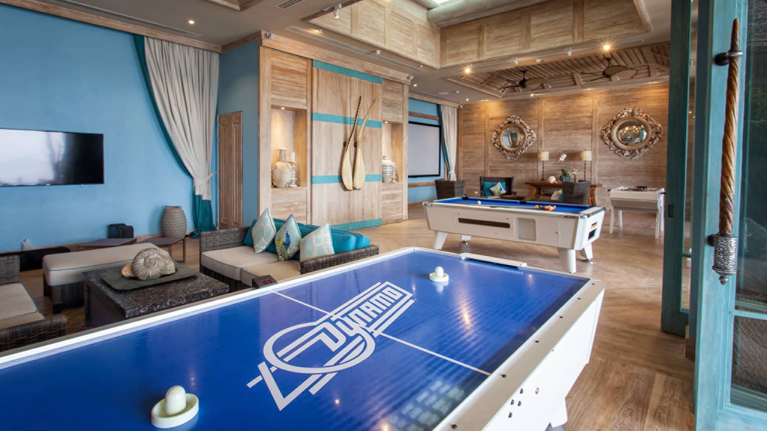 Table hockey, billiards in beach house games room