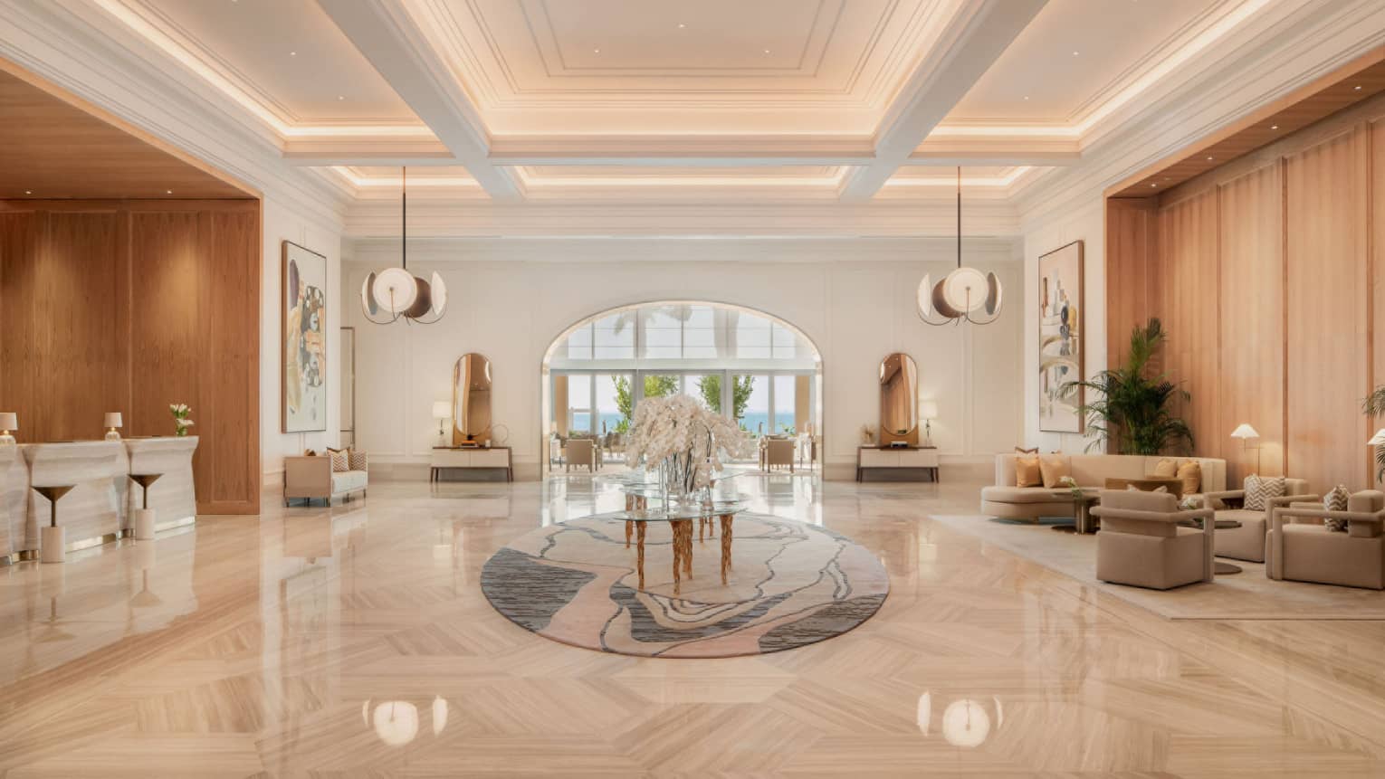 Elegant lobby with marble floors and large floral centrepiece