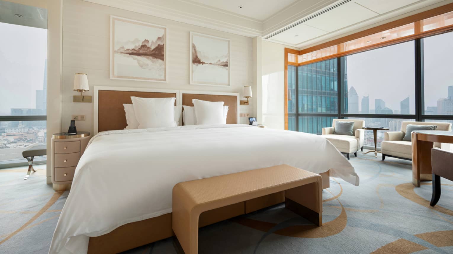 Hotel room with queen bed and city view