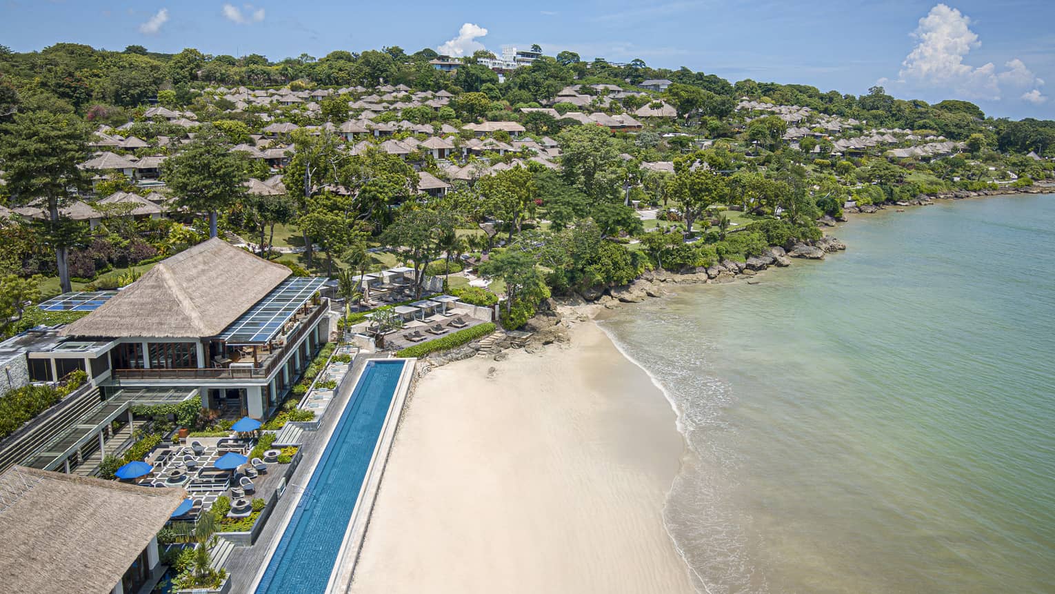 Aerial shot of the Resort, visible shoreline and foliage