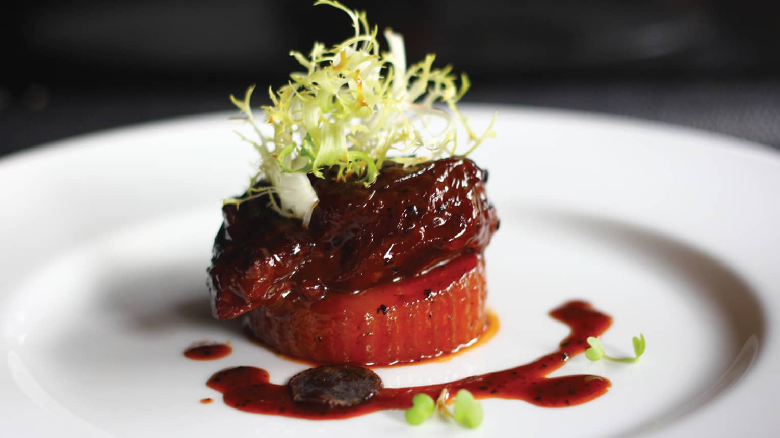 Modern Shanghainese and Cantonese entree garnished with frisee greens, sauce 
