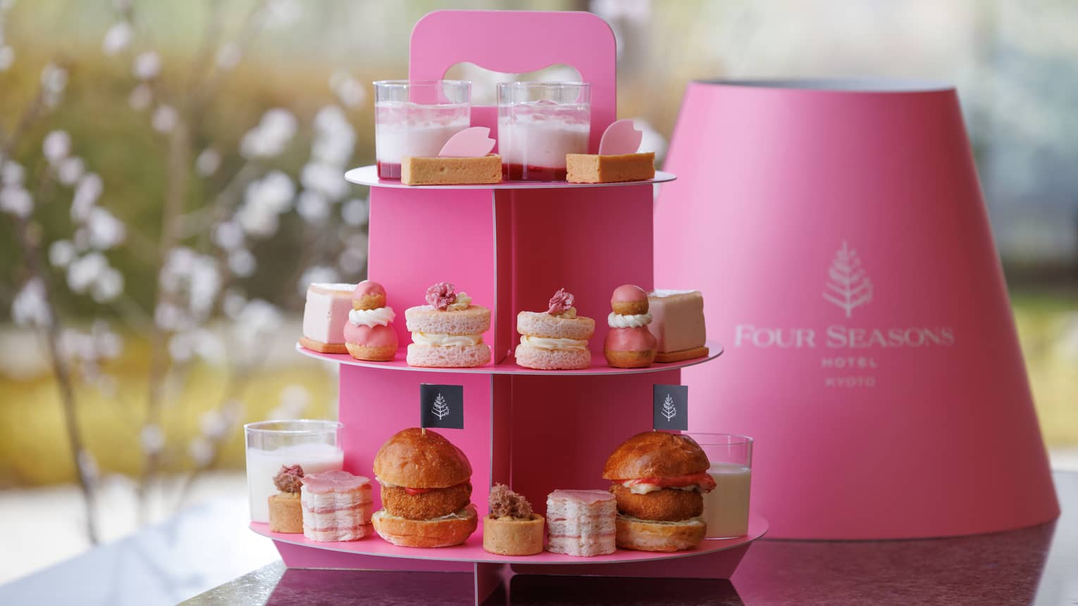 Takeaway Sakura Afternoon Tea in pink FS dome with stacked sweets and savouries