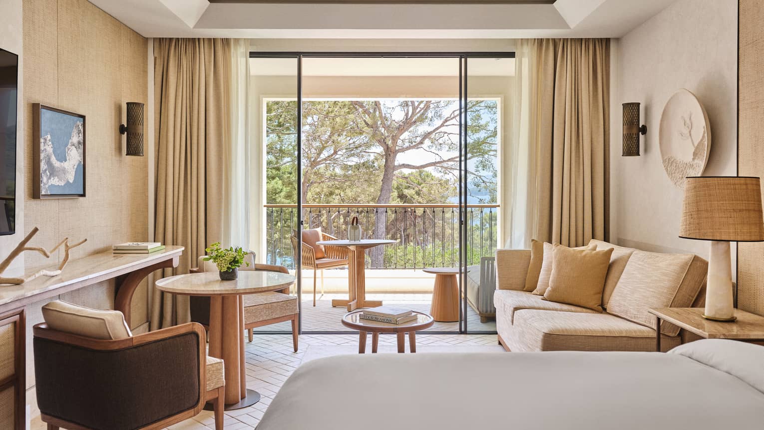 Luxury garden-view hotel room at at Four Seasons Resort Mallorca