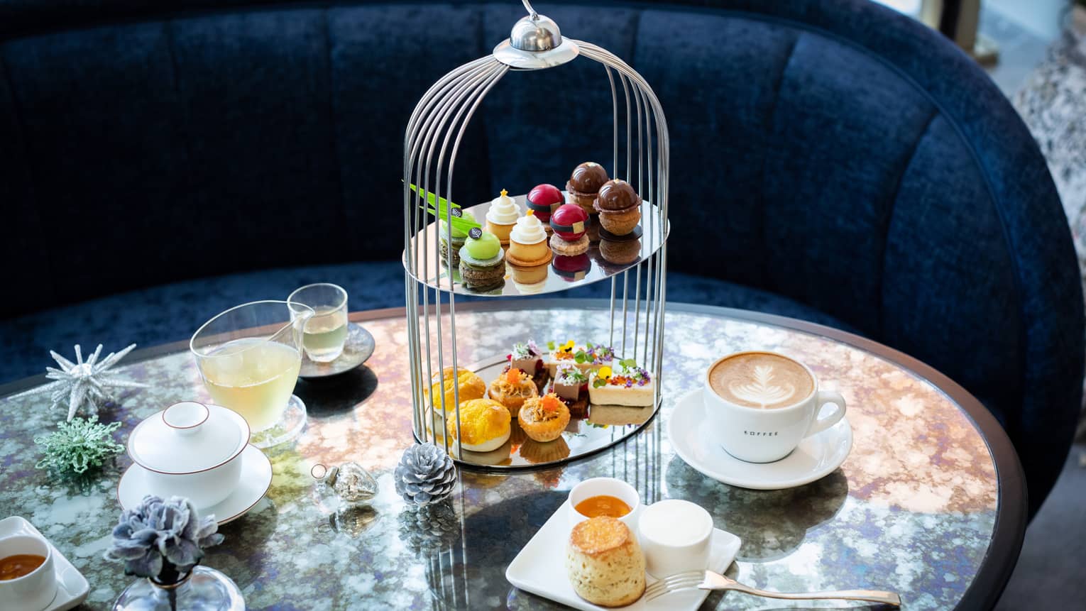 Holiday Afternoon Tea tower with sweets, coffee and tea