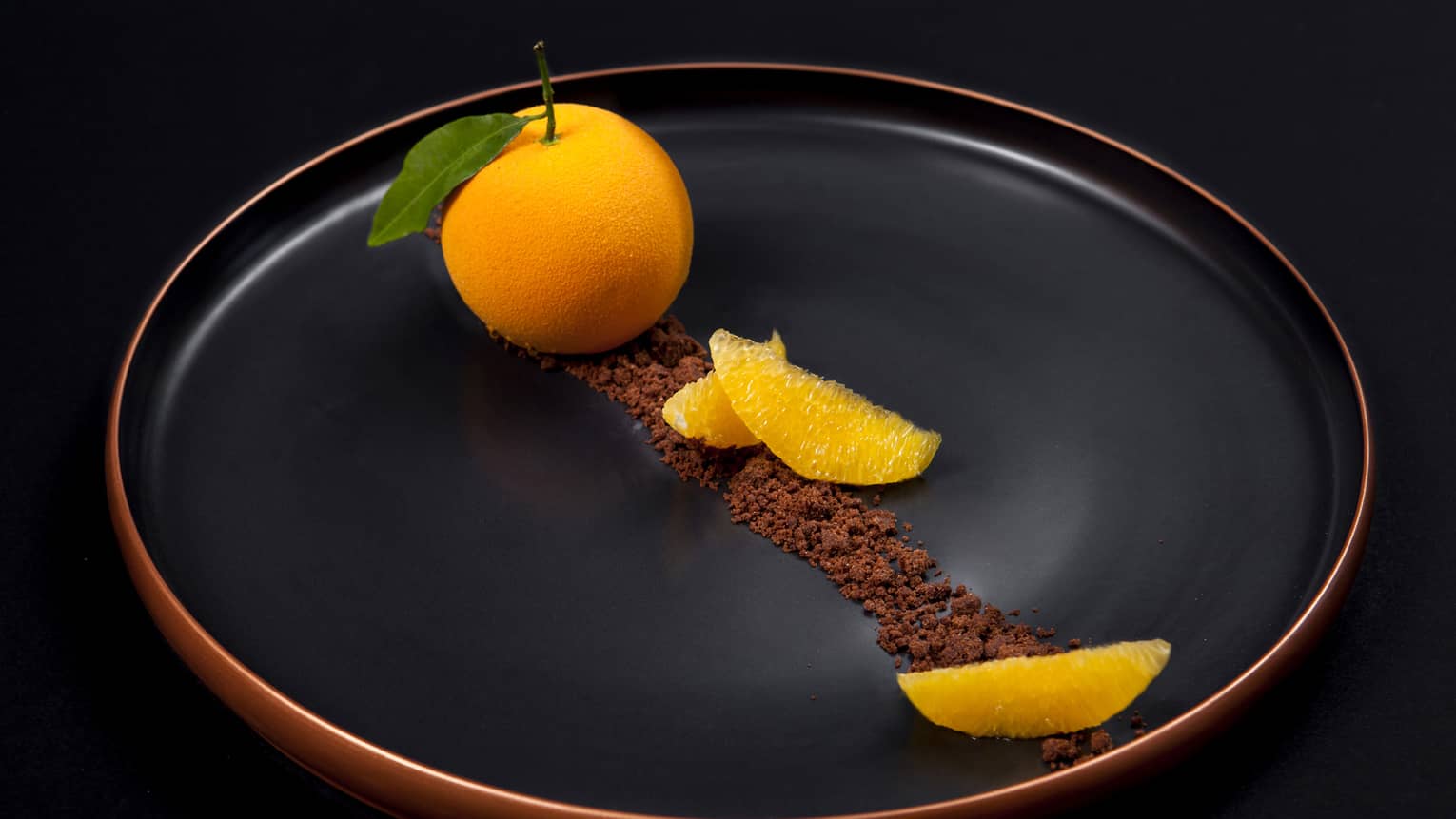 The Orange Signature Dessert served with cinnamon 