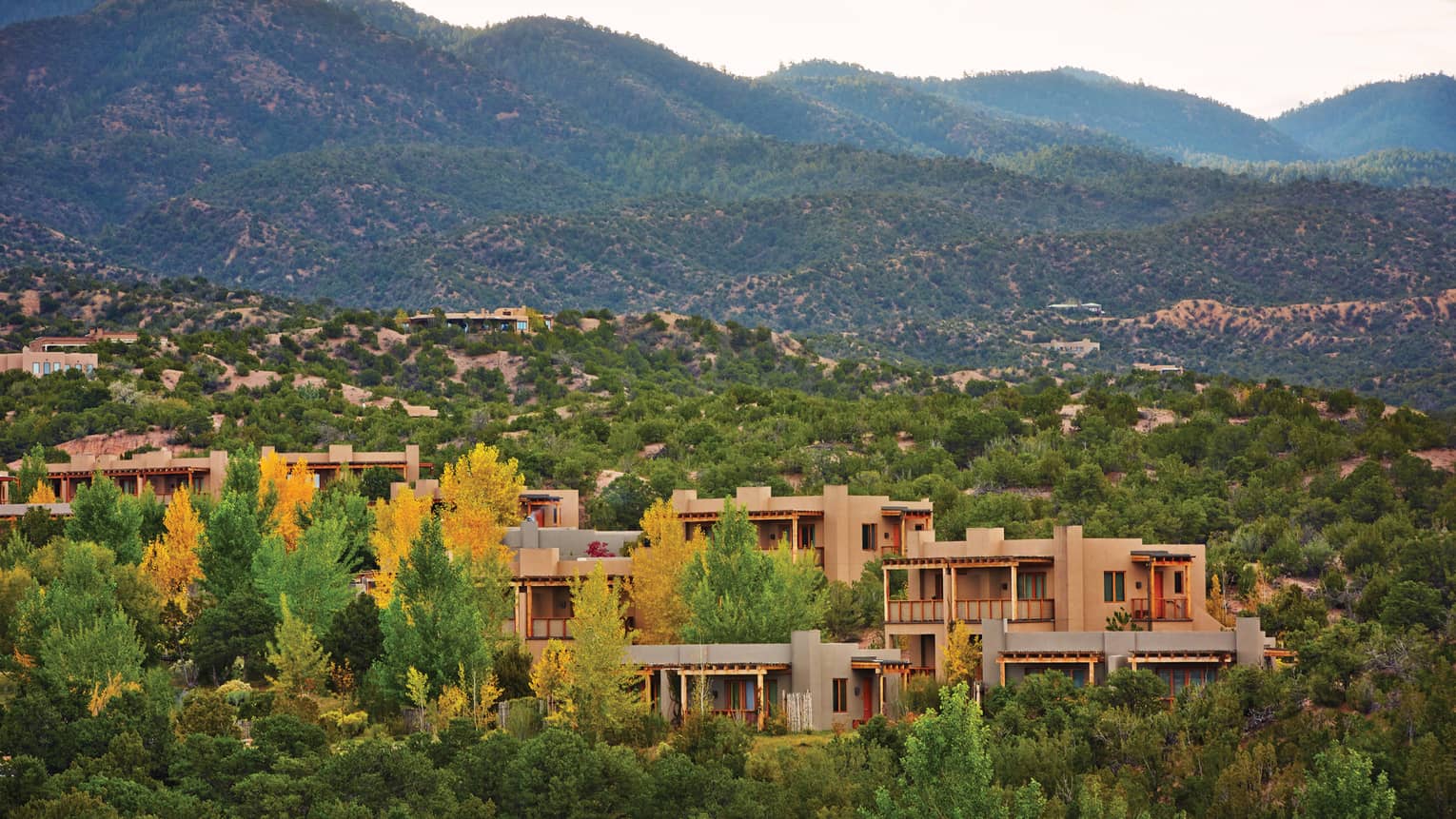 Aerial view of Four Seasons Resort Santa Fe in desert mountains