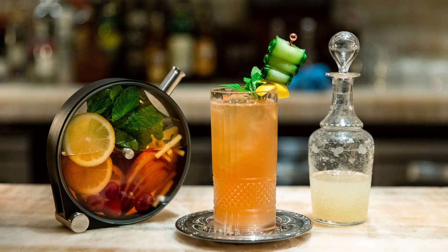 An orange coloured cocktail.