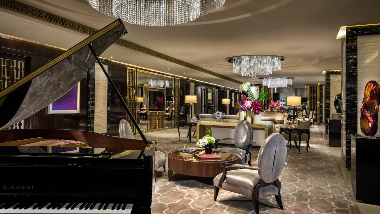 The expansive, ornate living and dining area in Four Season Hotel Beijing’s Imperial Suite. 