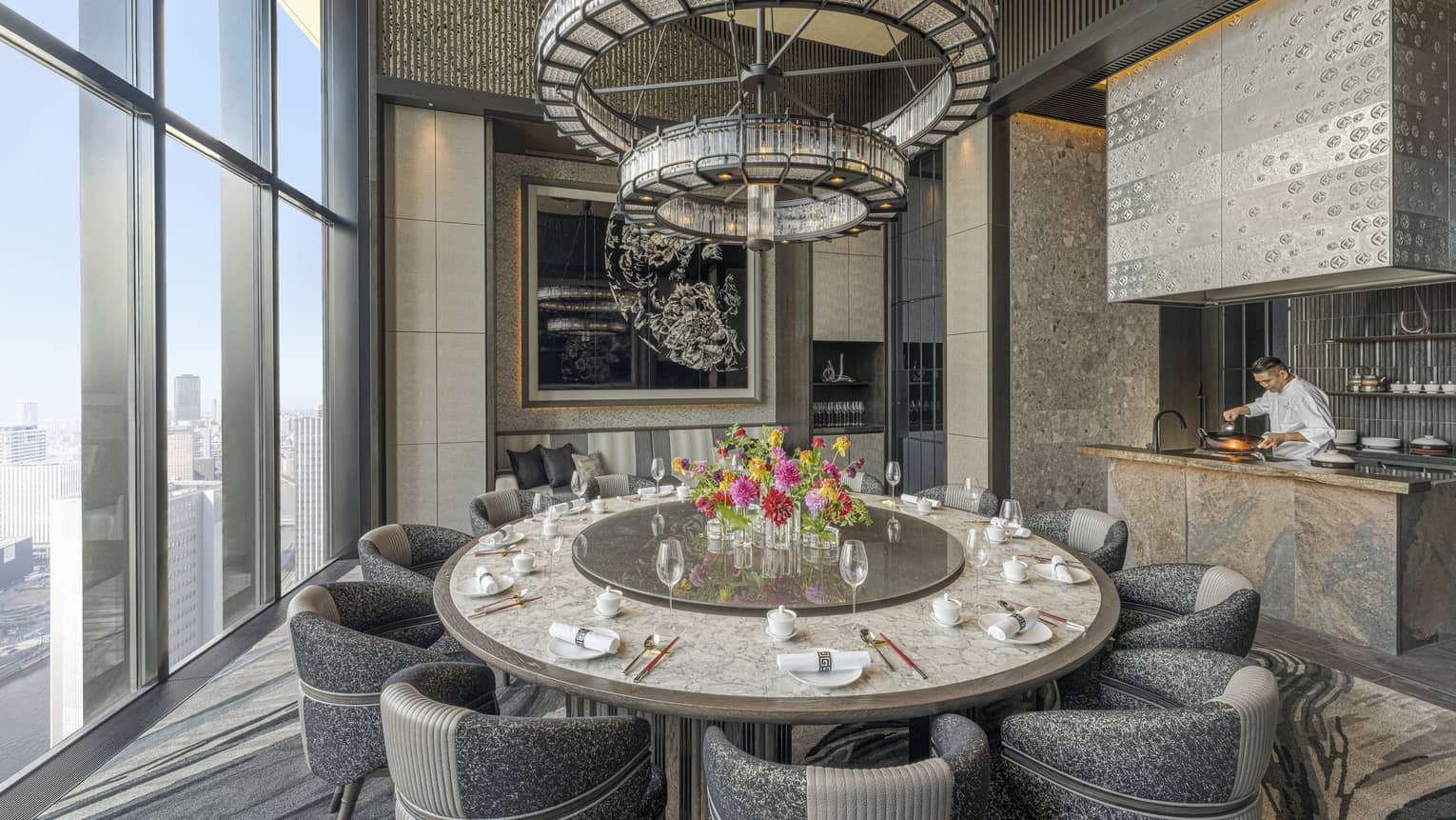 A large, round dining table at Jiang Nan Chun restaurant at Four Seasons Hotel Osaka