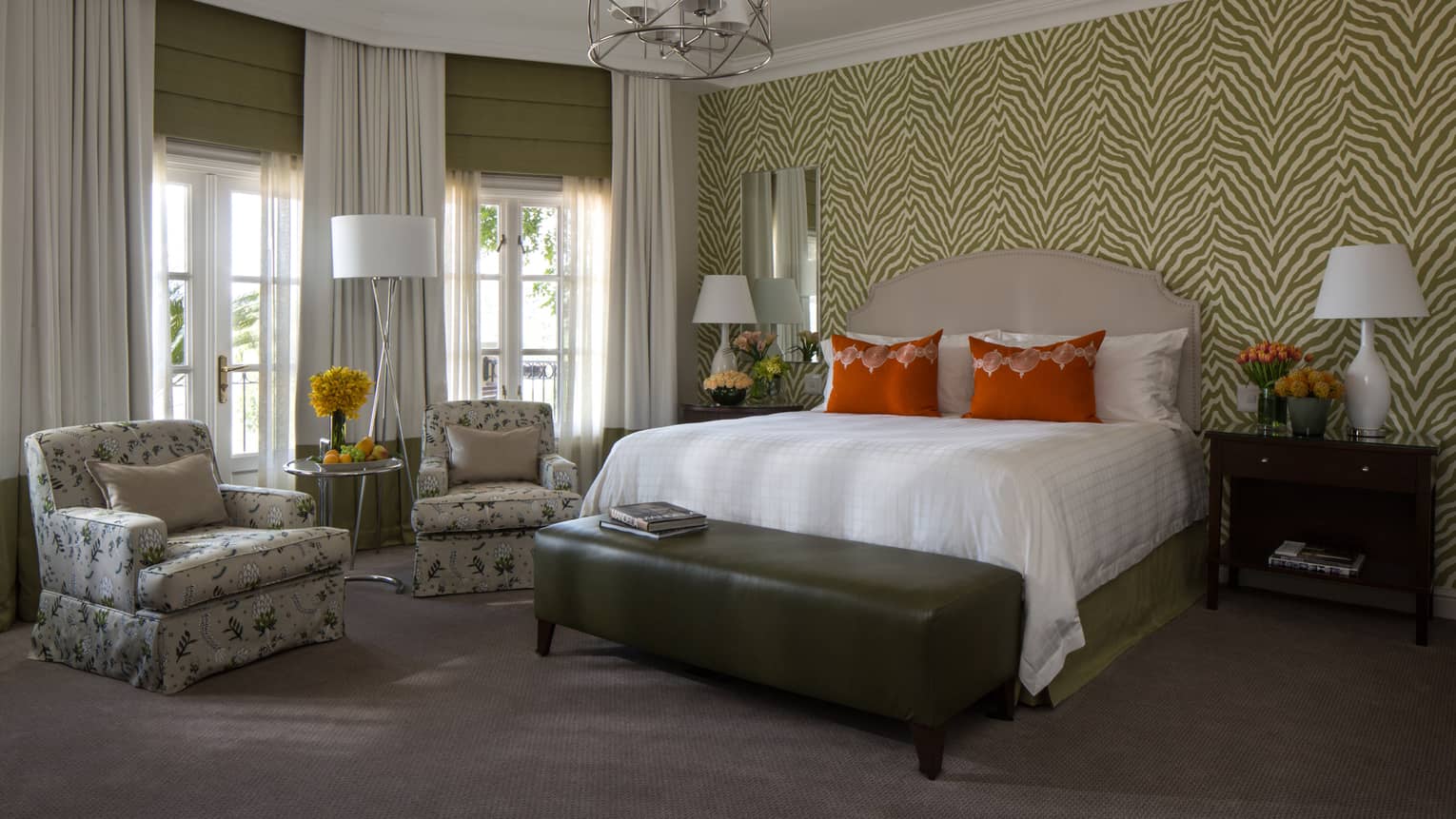 Garden-View Premier Room, two floral plush armchairs beside bed, white French doors, gold zebra-pattern wallpaper