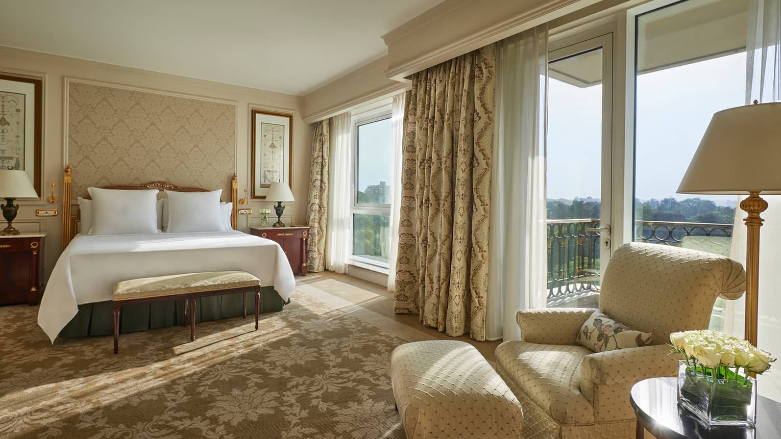 Cairo Hotel Giza Luxury Four Seasons At The First Residence Deluxe Room Bed Cream Coloured Armchair Beside Sunny Floor To Ceiling Patio