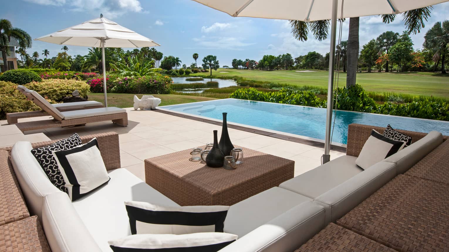 Palm Grove Residence Villa L-shaped patio sofa, cushions by plunge pool