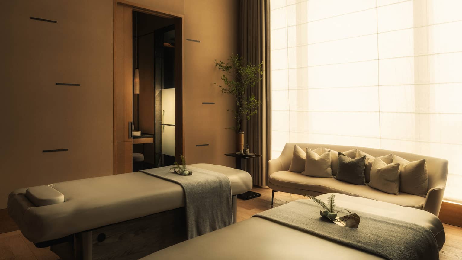 Spa treatment room with two tables