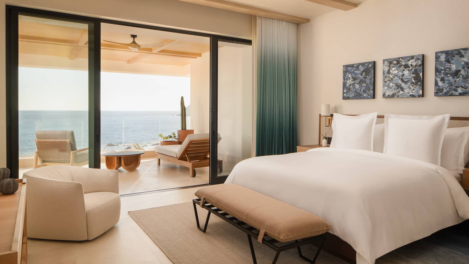 Bedroom with king bed and walk-out sea-view balcony