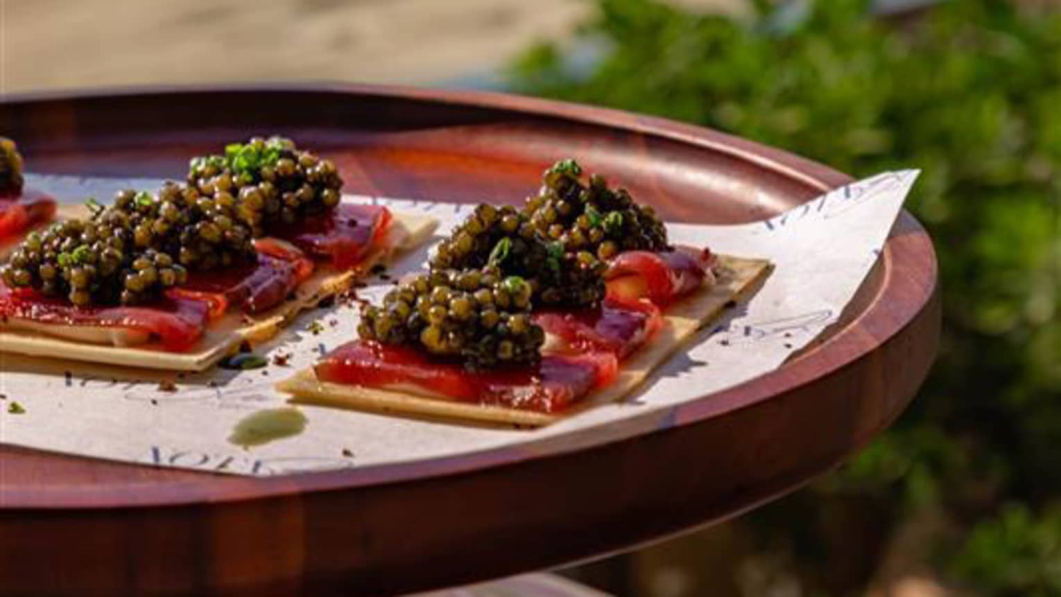 Caviar served at an outdoor table
