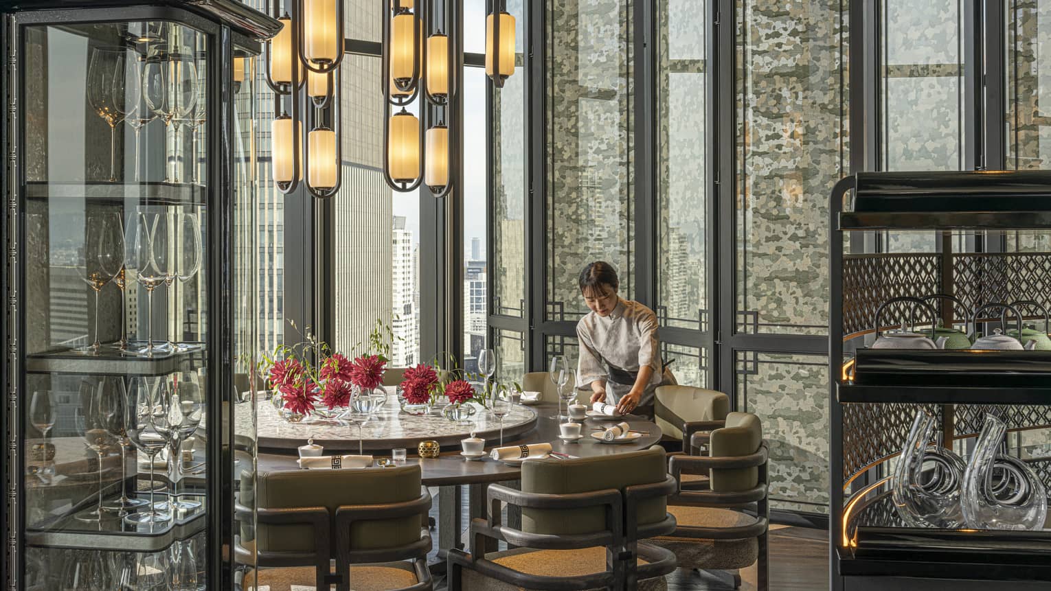 Light-filled dining area inside Jiang Nan Chun restaurant at Four Seasons Hotel Osaka