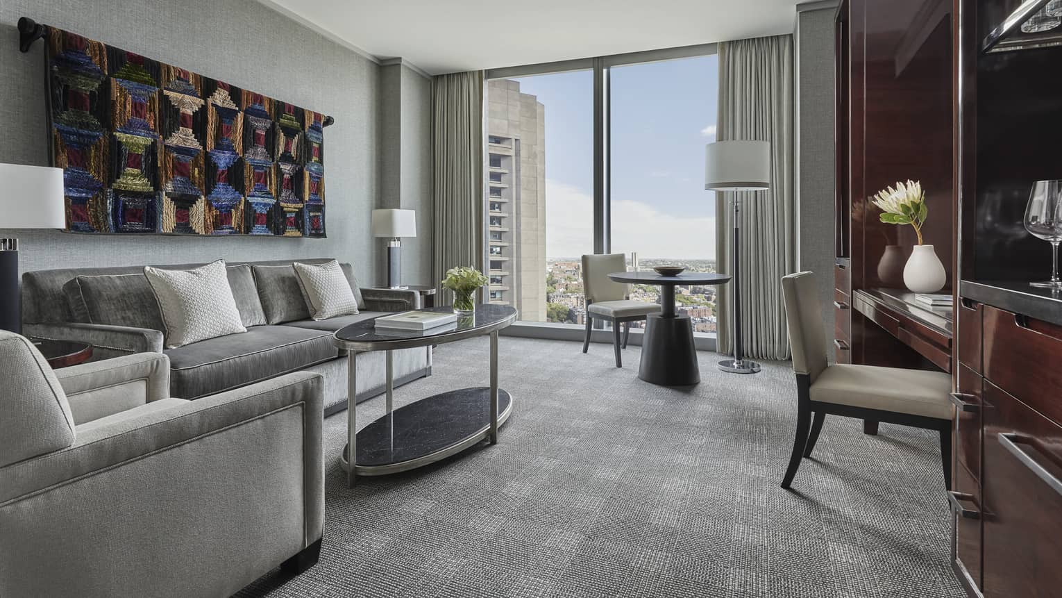Guest sitting area in the corner suite at four seasons boston one dalton