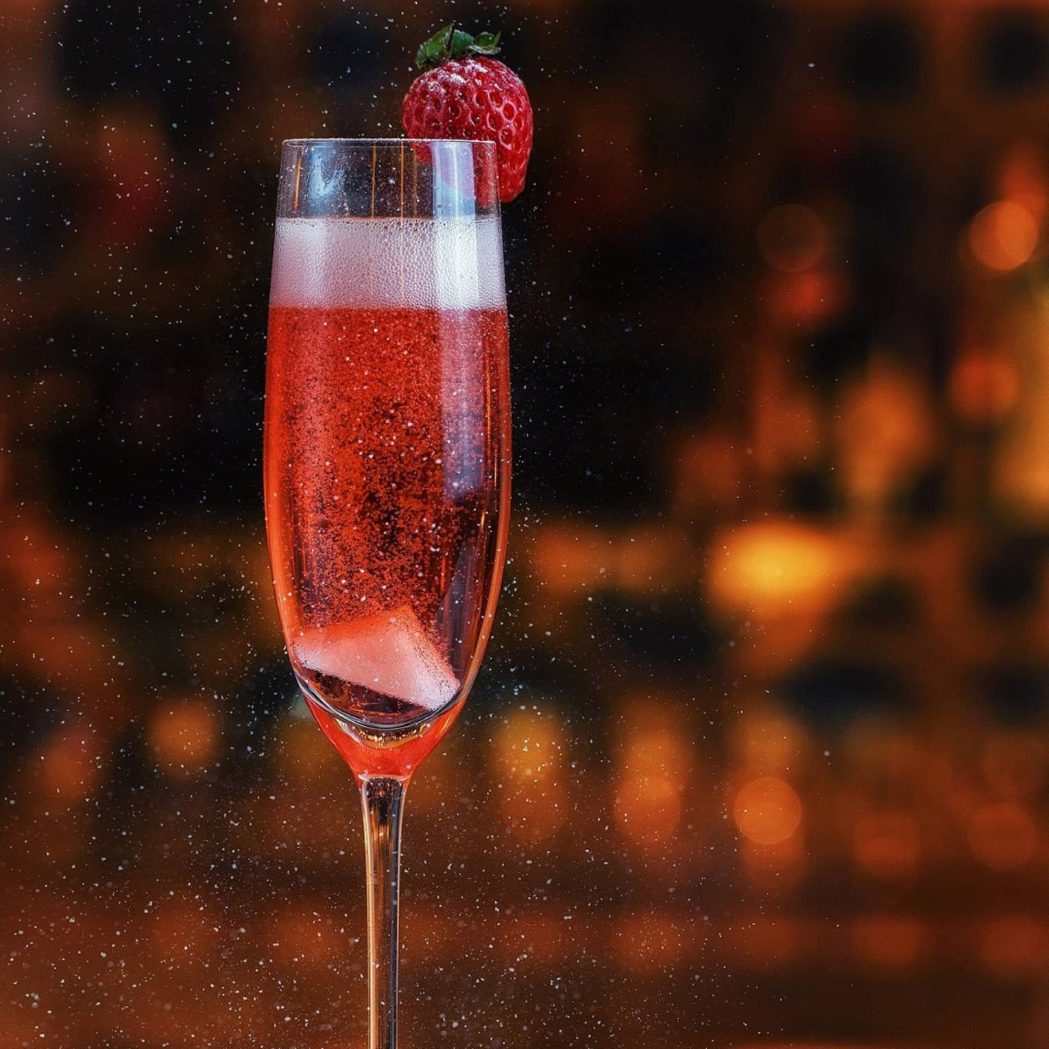 Christmas cocktail with berry on the rim