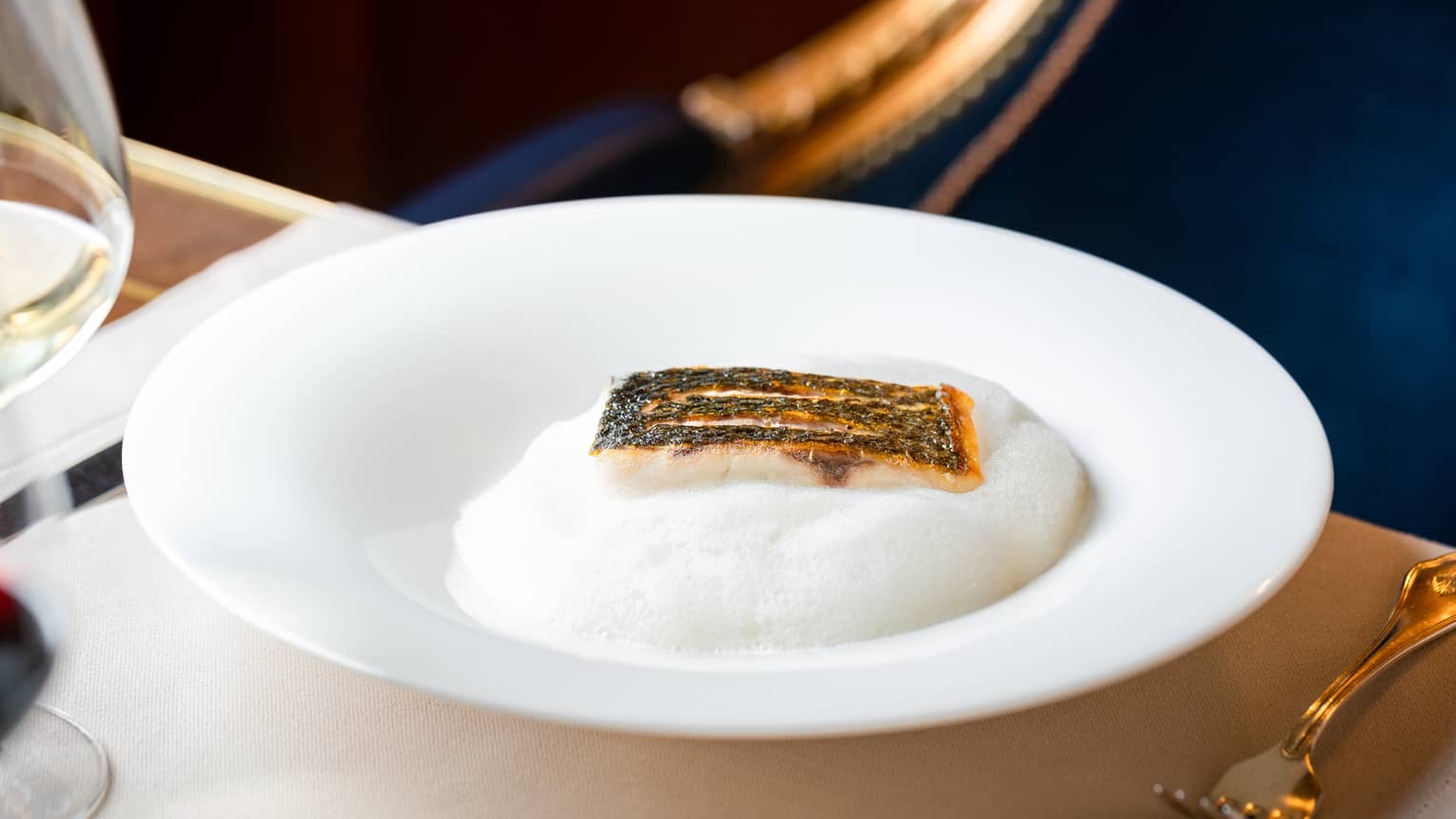 Wild sea bass, roasted artichoke, and lemon emulsion