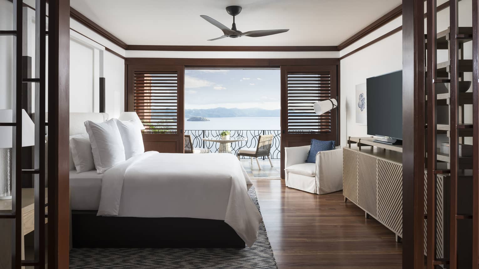 One-Bedroom Residence Villa with Plunge Pool wood framed wall to bedroom, wood shutters beside sunny patio door
