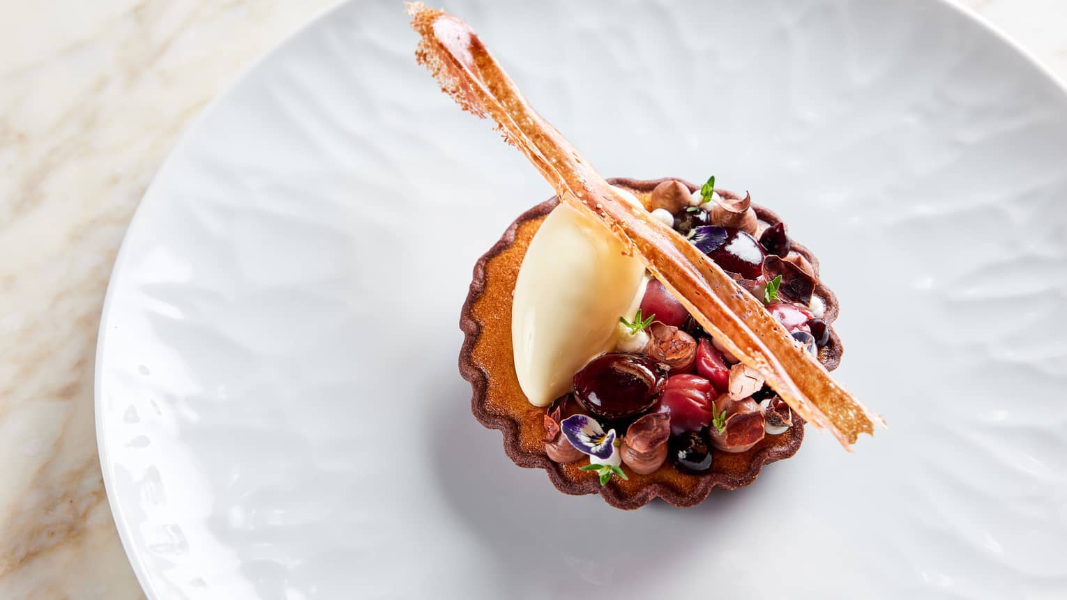 Cherry Clafoutis with Dark Chocolate Cr�meux, Thyme and Cream Cheese Ice Cream with Wafer garnish on white plate