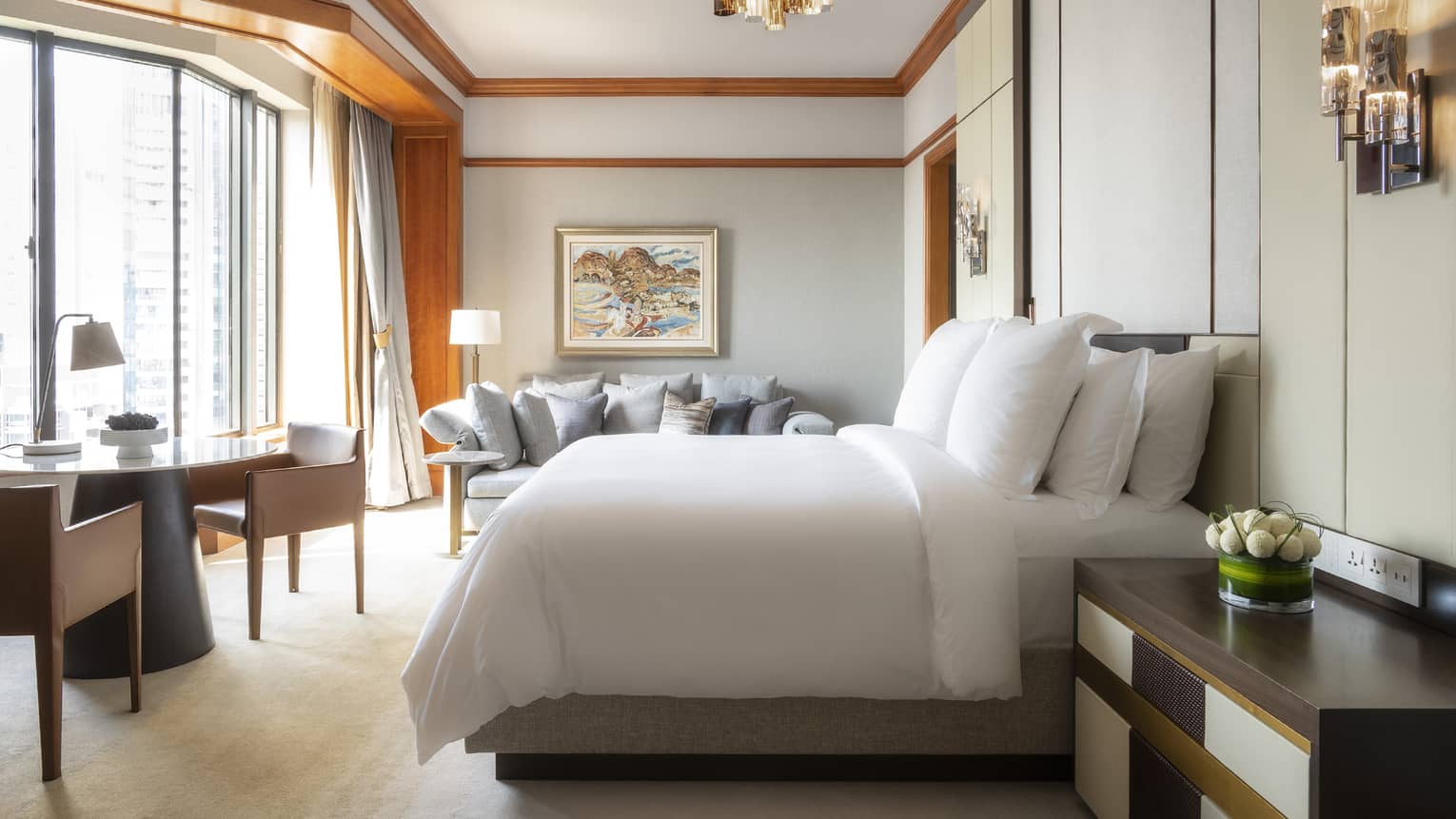 Governor Suite Bedroom with small dining area and floor-to-ceiling windows