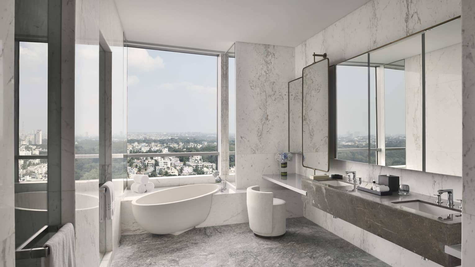 Bathroom with window and free-standing tub
