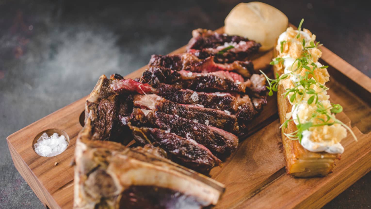 Sliced sirloin on a cutting board.