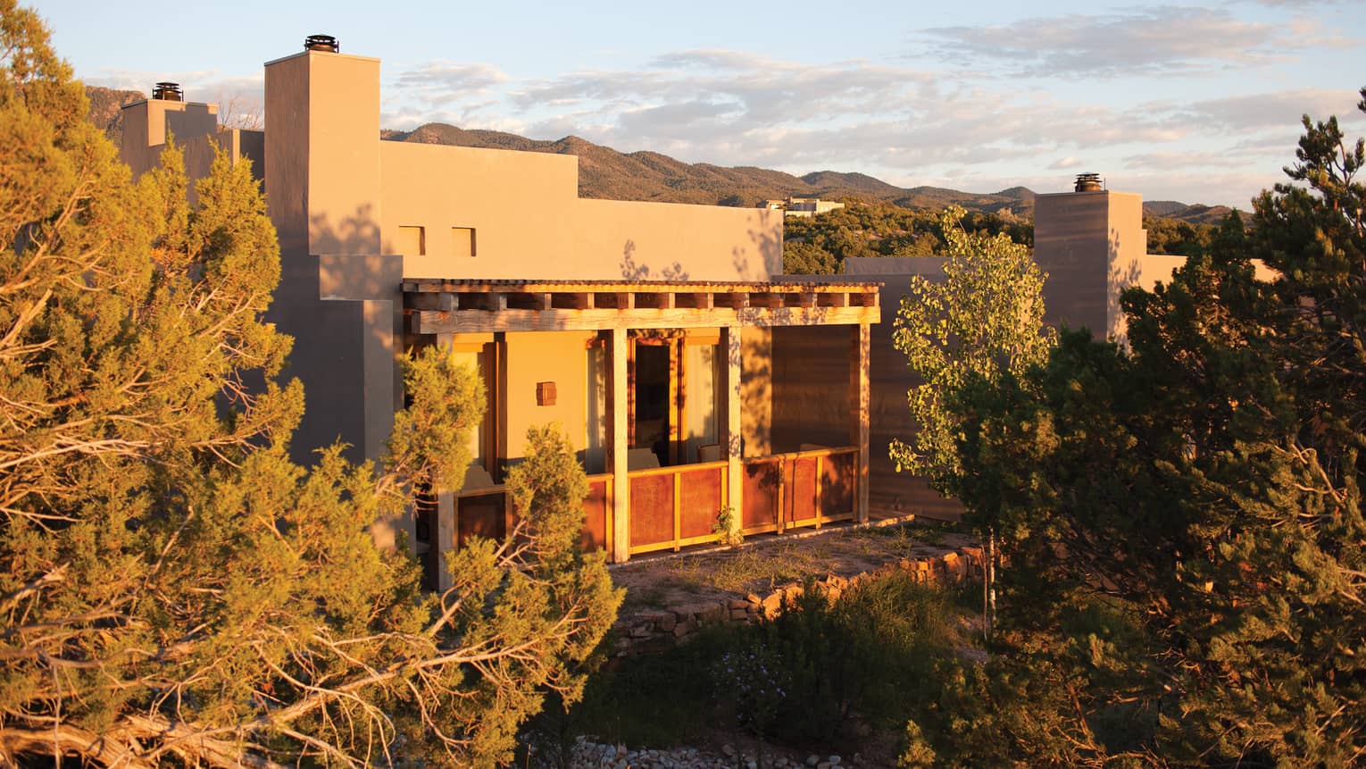Deluxe Casita single-storey Southwestern-style building exterior on desert mountain