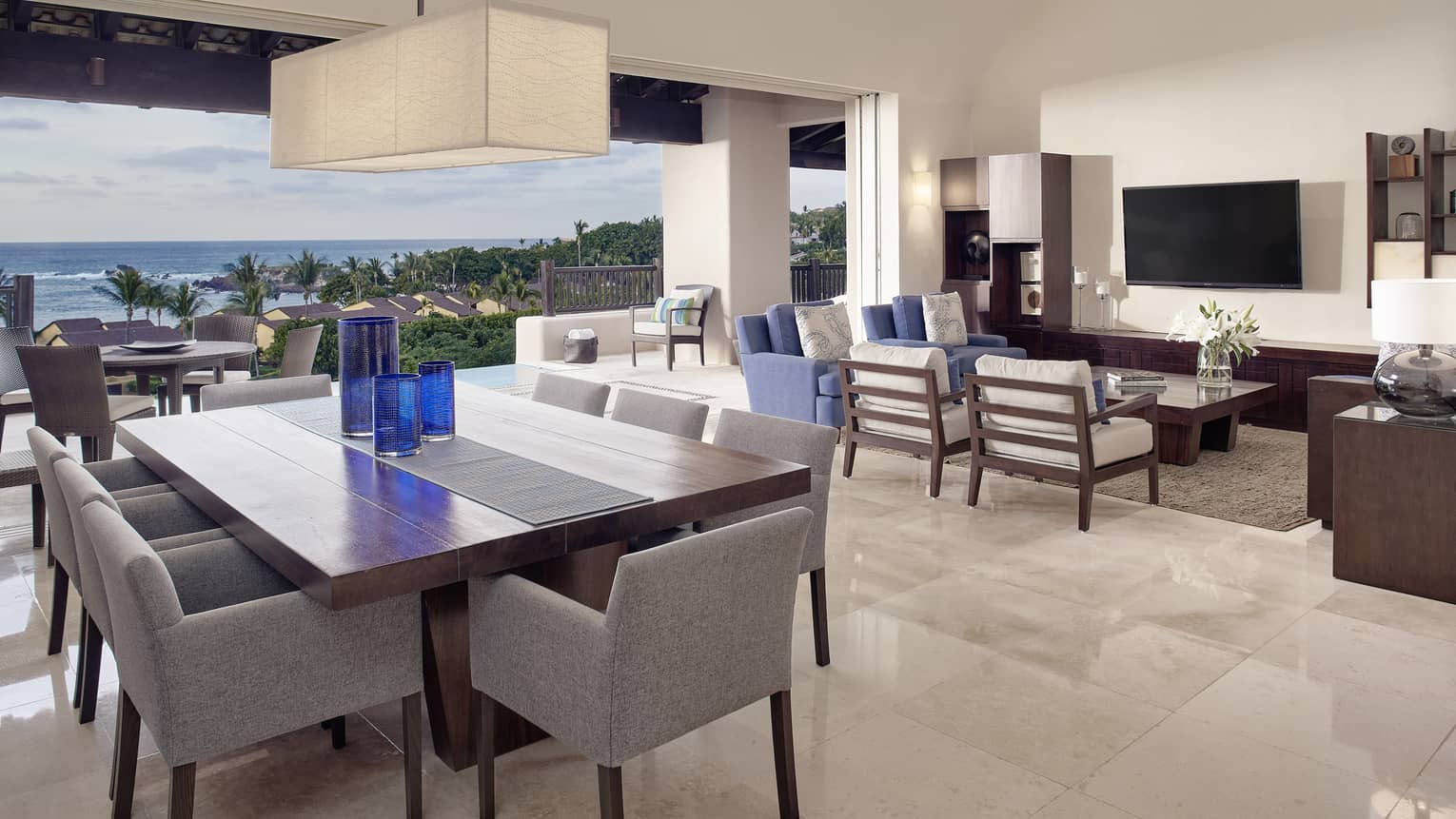 Dining Area and Living Room at Four-bedroom Ocean-view Penthouse in Mexico.