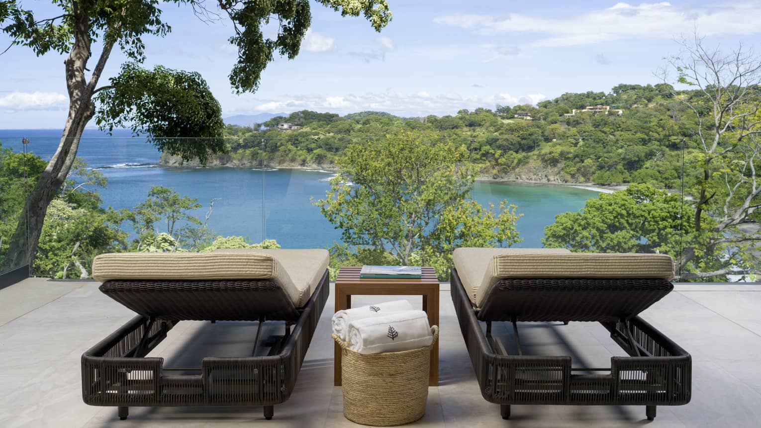 Two lounge chairs on Prieta Bay Suite patio