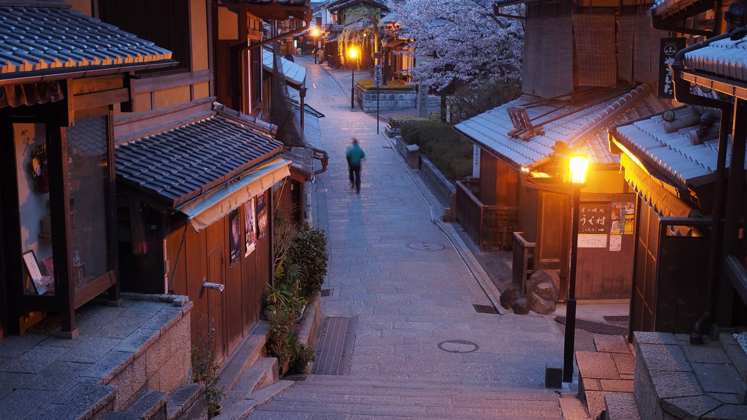 a winter scene on a shopping street in kyoto